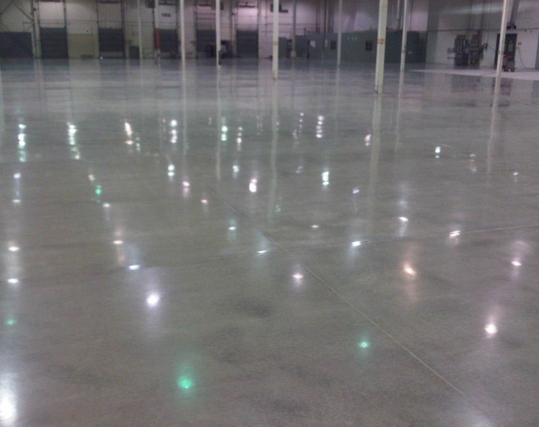 Empty warehouse
        in Toronto with lustered polished concrete floors