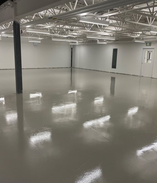 Industrial
            facility in Toronto cracked and dull green floors