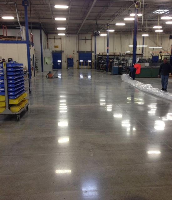 New polished
            concrete floors in Toronto industrial warehouse